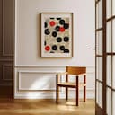 Room view with a matted frame of A contemporary textile print, pattern of circles