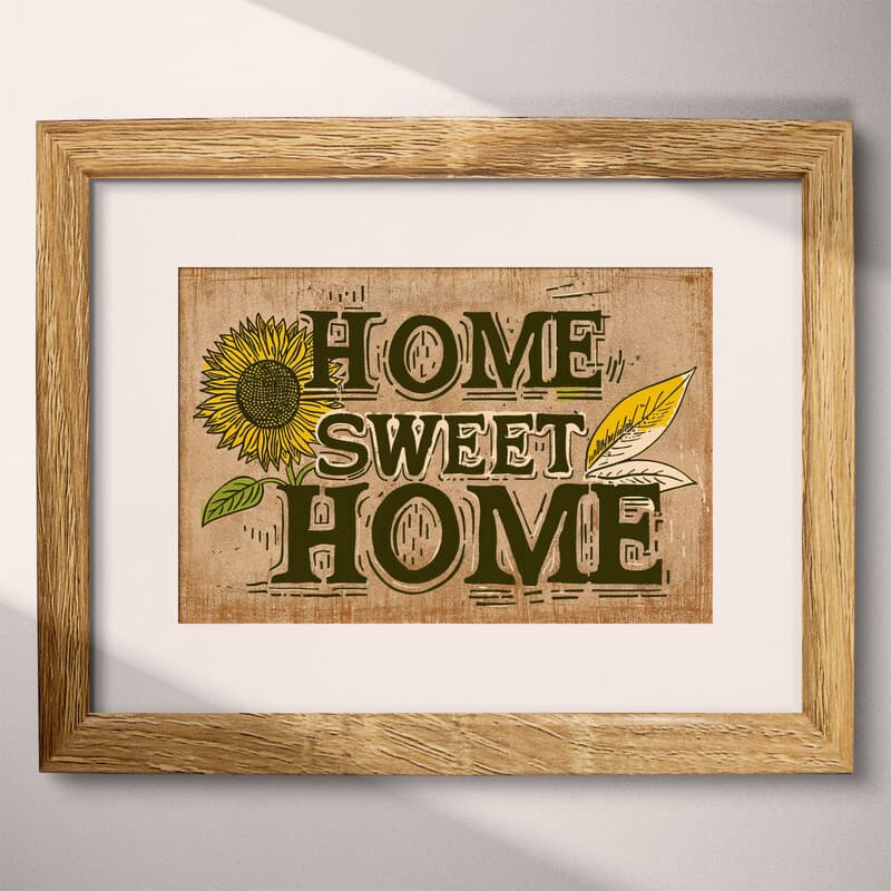 Matted frame view of A vintage linocut print, the words "HOME SWEET HOME" with a sunflower