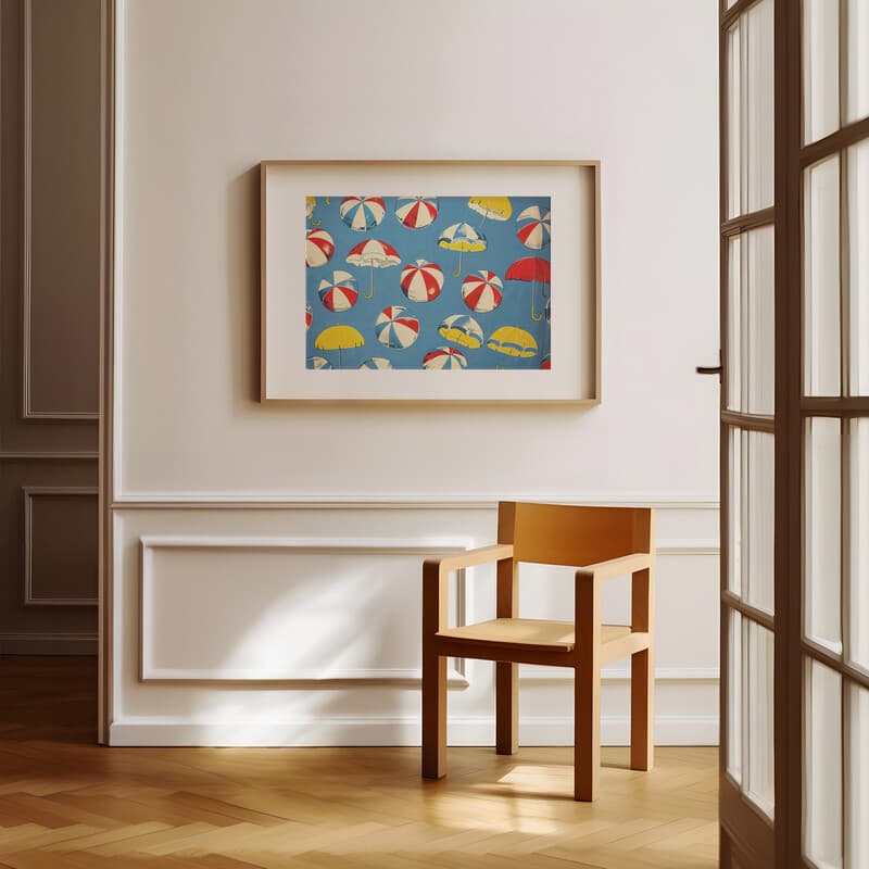 Room view with a matted frame of A maximalist textile print, pattern of beach balls and beach umbrellas