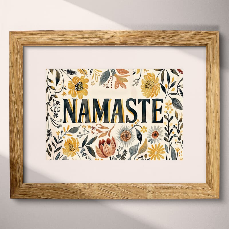 Matted frame view of A botanical linocut print, the words "NAMASTE" with a floral pattern