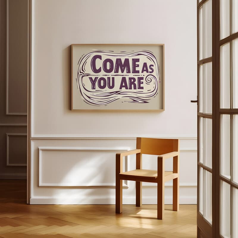 Room view with a full frame of A minimalist linocut print, the words "COME AS YOU ARE"