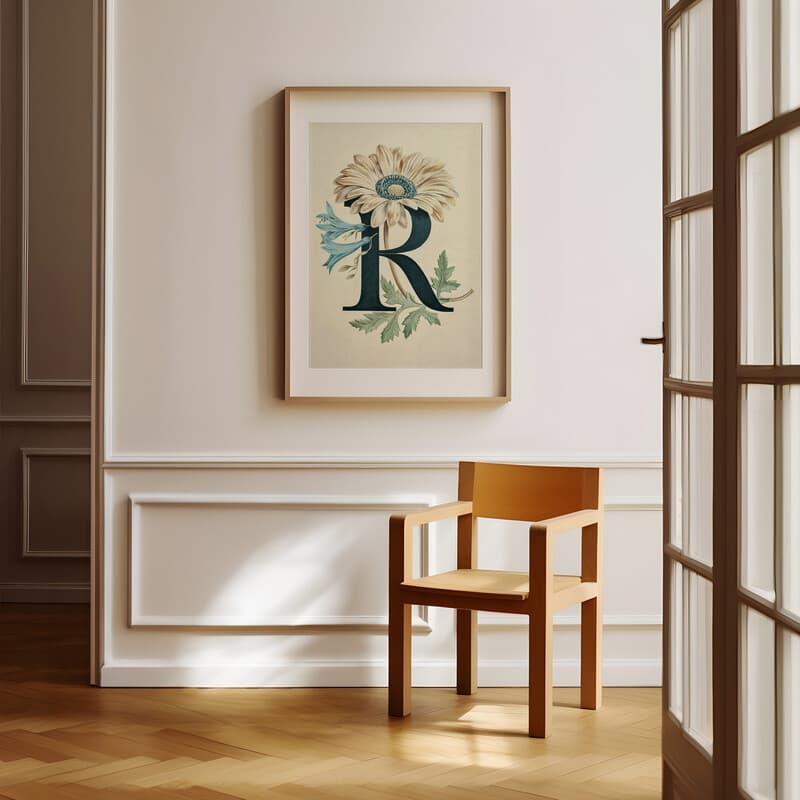 Room view with a matted frame of A vintage pastel pencil illustration, the letter "R" with a flower