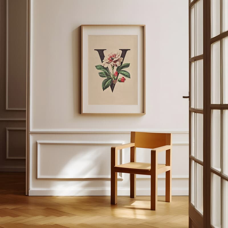 Room view with a matted frame of A vintage pastel pencil illustration, the letter "V" with a flower