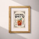 Matted frame view of A vintage linocut print, the words "APEROL SPRITZ" with a spritz coctail