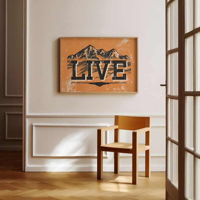 Room view with a full frame of A contemporary linocut print, the words "LIVE" with mountains