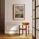 Room view with a matted frame of An impressionist oil painting, a country road by a green field, clouds in the sky