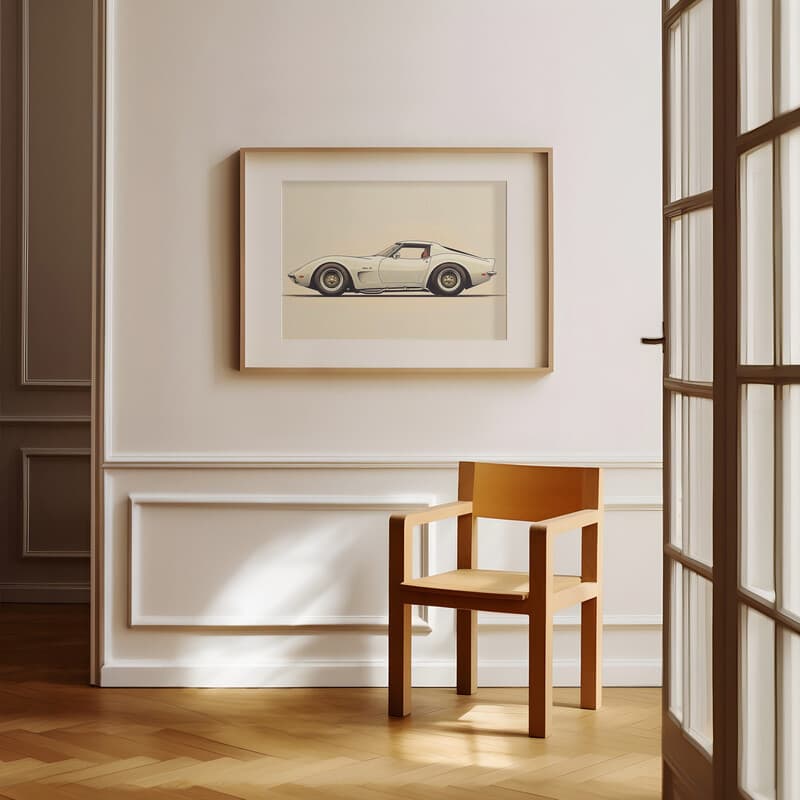 Room view with a matted frame of A retro letterpress print, a sports car