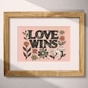 Matted frame view of A bohemian linocut print, the words "LOVE WINS" with flowers