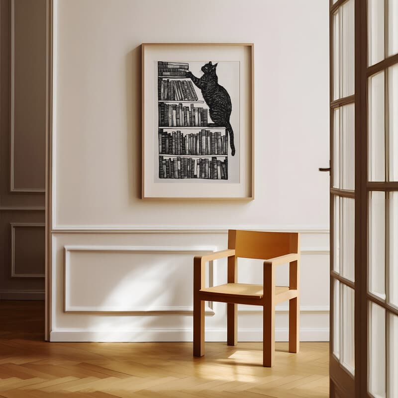 Room view with a matted frame of A vintage graphite sketch, a cat on a bookshelf