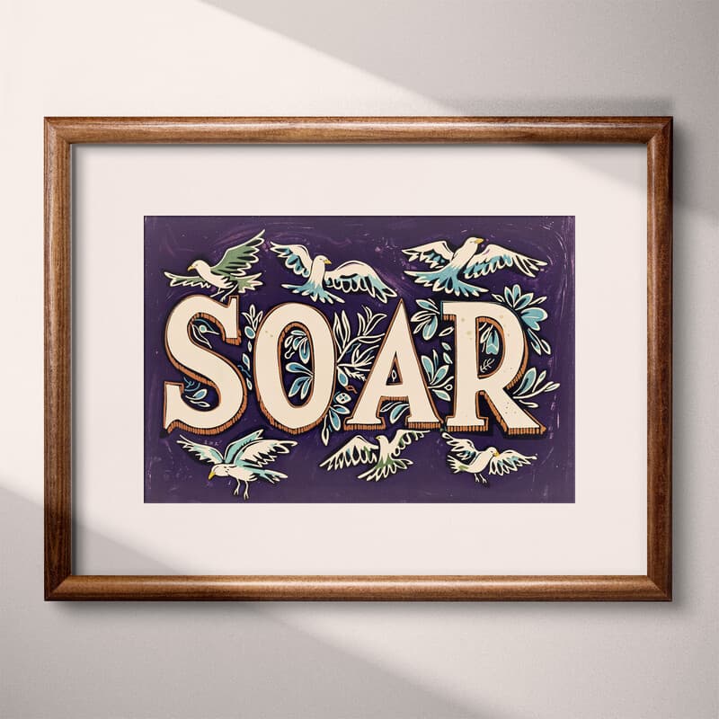 Matted frame view of A vintage linocut print, the word "SOAR" with birds