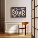 Room view with a full frame of A vintage linocut print, the word "SOAR" with birds