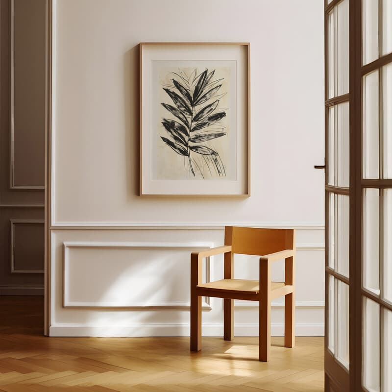 Room view with a matted frame of A botanical graphite sketch, a fern