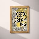 Full frame view of A vintage linocut print, the words "KEEP DREAMING" with a whimsical pattern