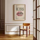 Room view with a full frame of A vintage linocut print, the word "KISS" with a set of lips