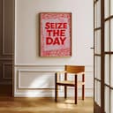 Room view with a full frame of A minimalist linocut print, the words "SEIZE THE DAY"